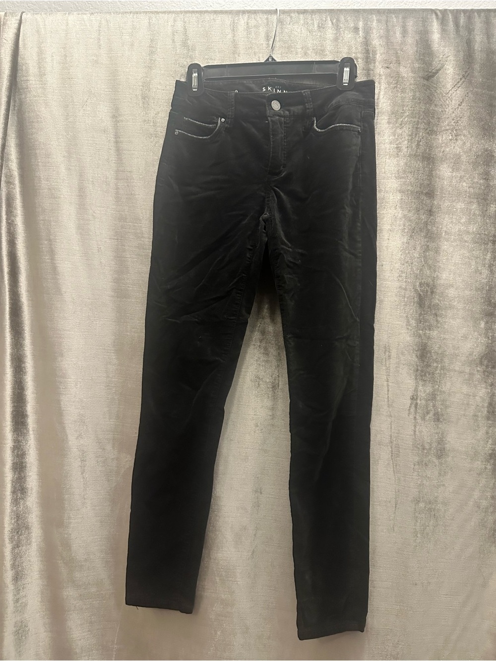 WHBM women’s Slim Jeans in Black Velvet with silver trim on pockets